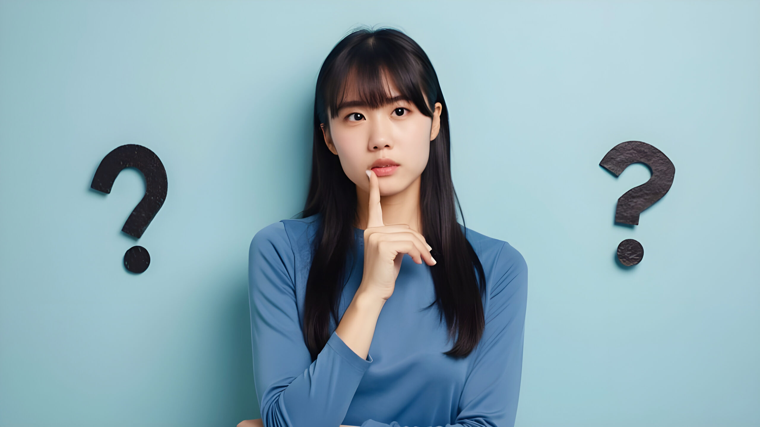 thoughtful woman surrounded by question marks blue background scaled